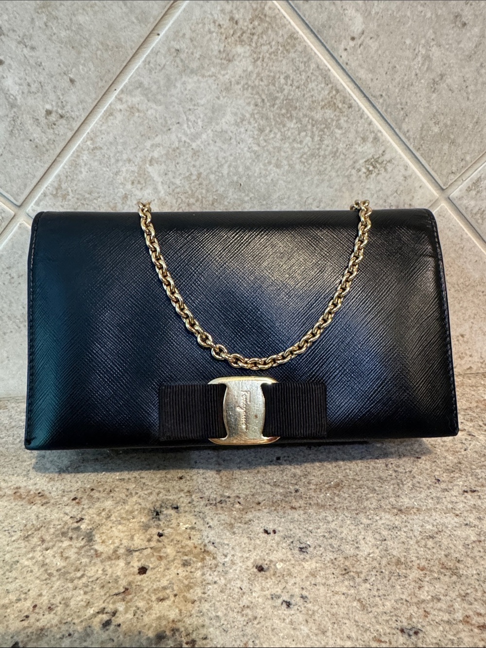 Salvatore Ferragamo Leather large wallet on chain.